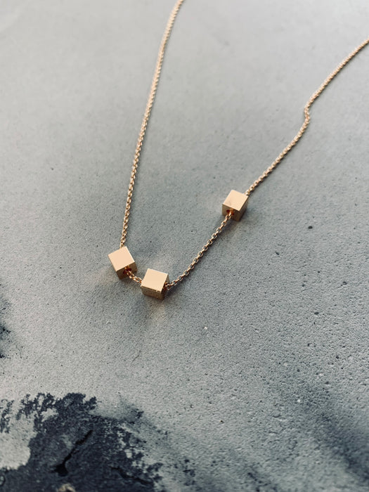 Tiny Golden Cube Necklace