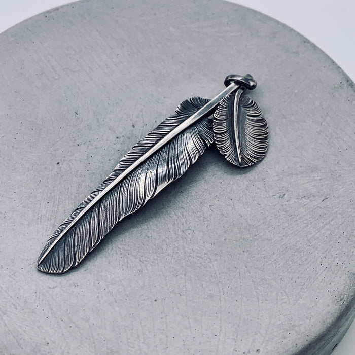 Floating Kwai Fan Feather Pendant