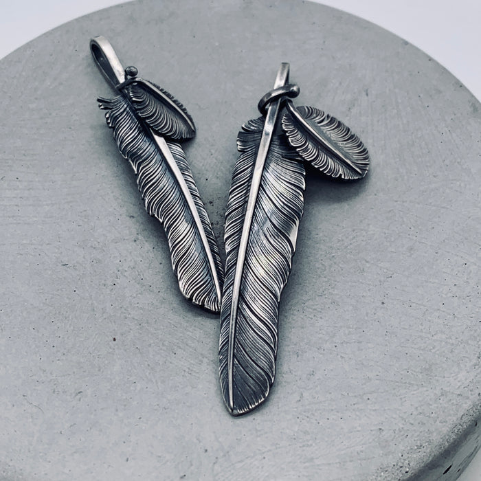 Floating Kwai Fan Feather Pendant